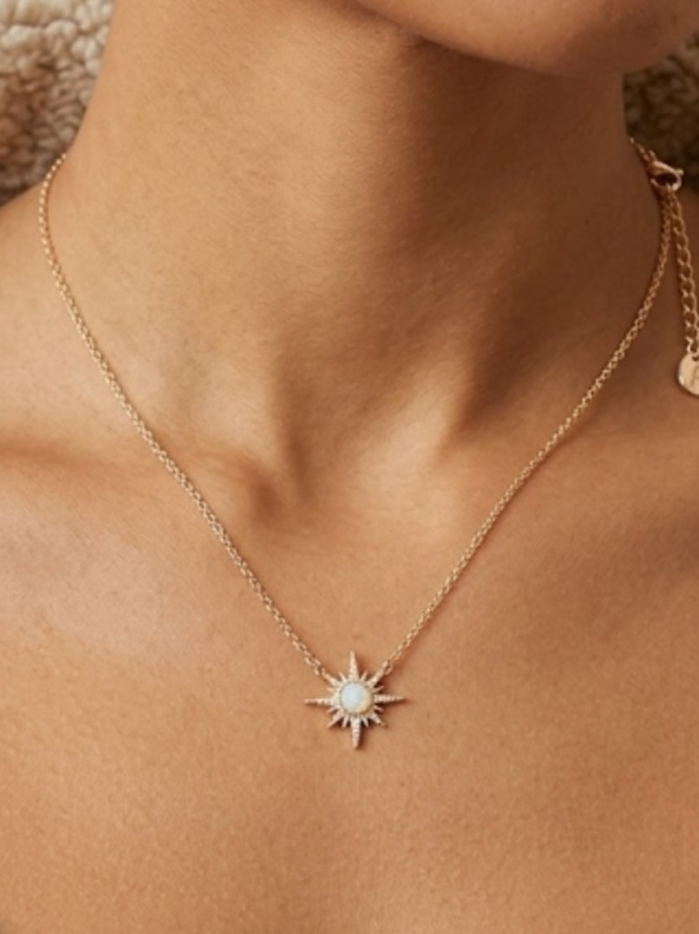 Ardene Gold Starburst Pendant Necklace with Opal-Style Stone
